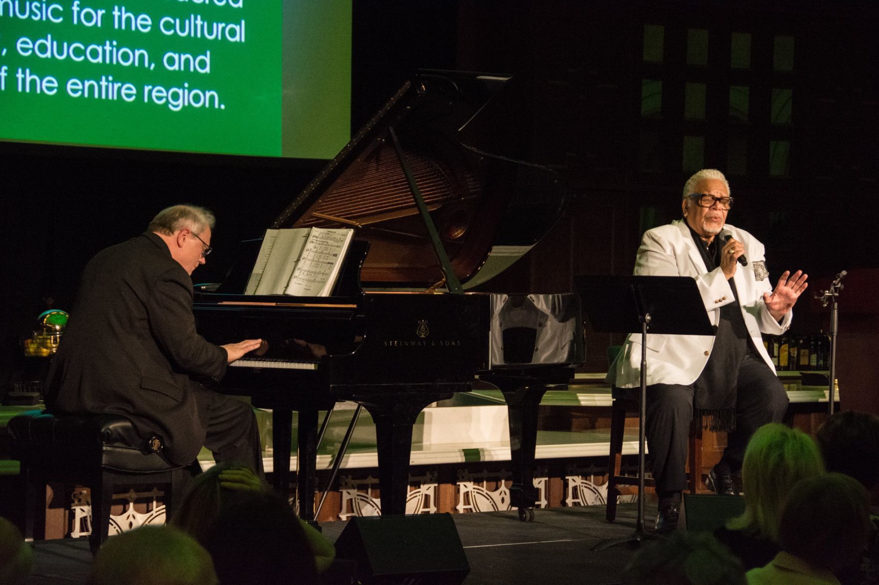Greg Schweizer on the Piano, Ken Page of the Muny sings at the Saint Louis Cathedral Concerts Gala